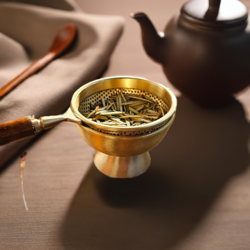 tea strainer made in brass, comes with resting cup