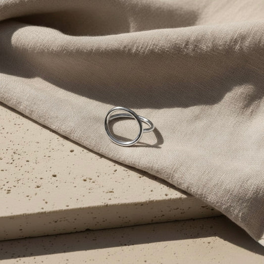 The Langa open-circle brass ring by Oriaku Studio, a sleek minimalist design inspired by the Zulu word for sun.