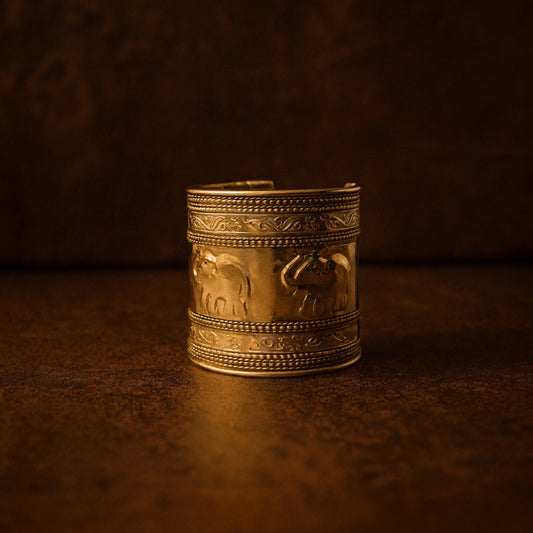 Close-up of the sculptural elephant motifs on the Sabu cuff, representing leadership and grounded power.