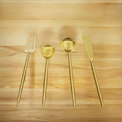 The Relic Cutlery Set, a 4-piece handcrafted flatware collection featuring a minimalist yet rustic aesthetic.