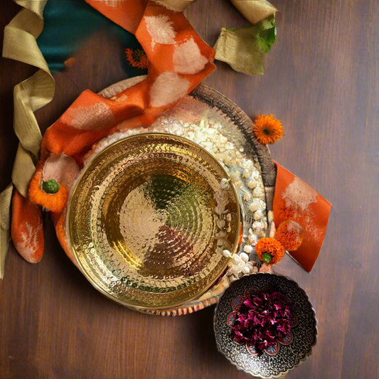 Close-up of the rhythmic hammered texture on the metal surface, designed to catch the light with a warm, soulful glow.