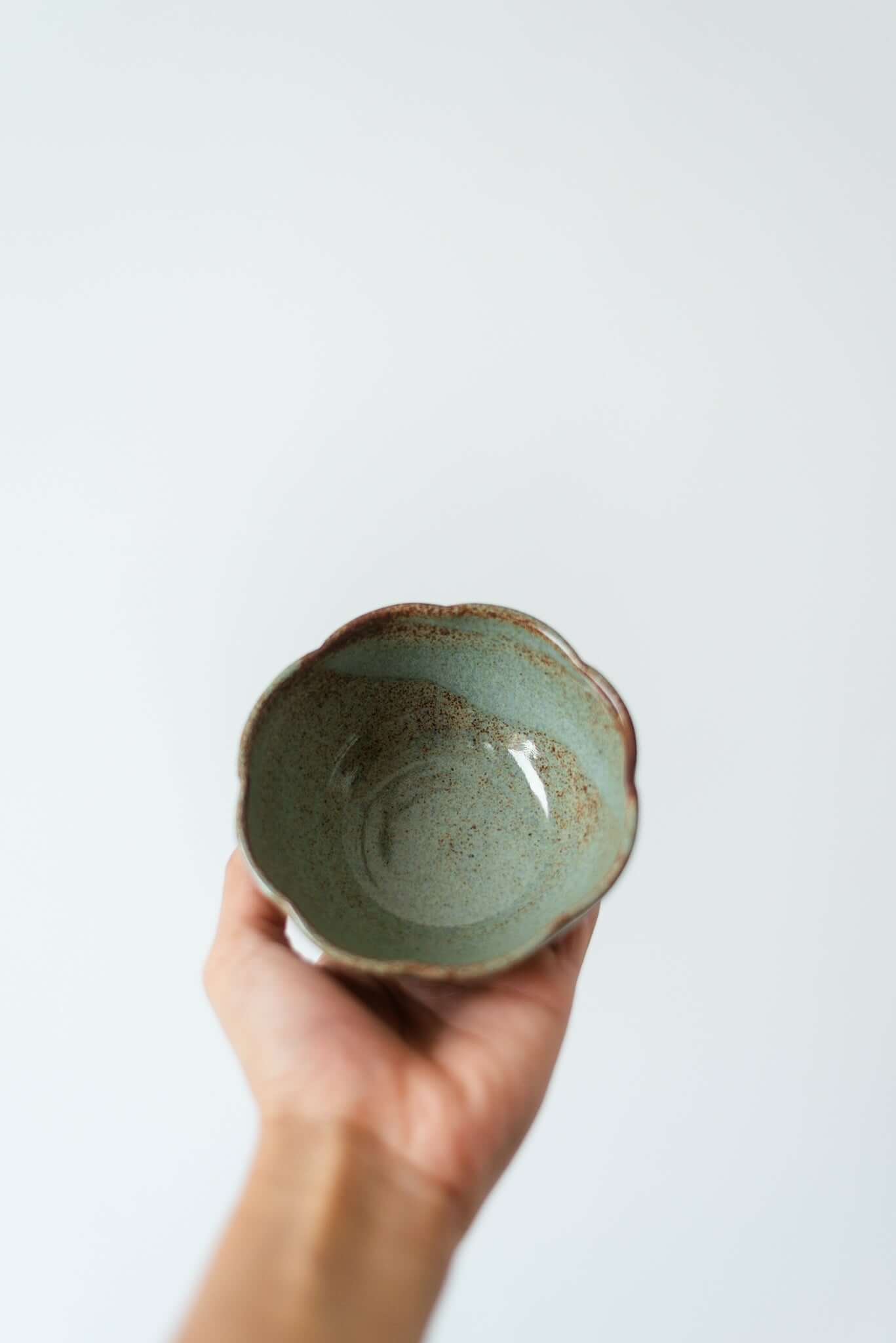 Handcrafted rusty blue ceramic dessert bowl with a smooth glazed finish, ideal for serving desserts and snacks.