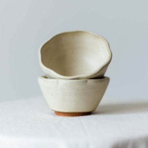 Handcrafted rusty white ceramic dessert bowl with a smooth glazed finish, perfect for serving desserts and snacks