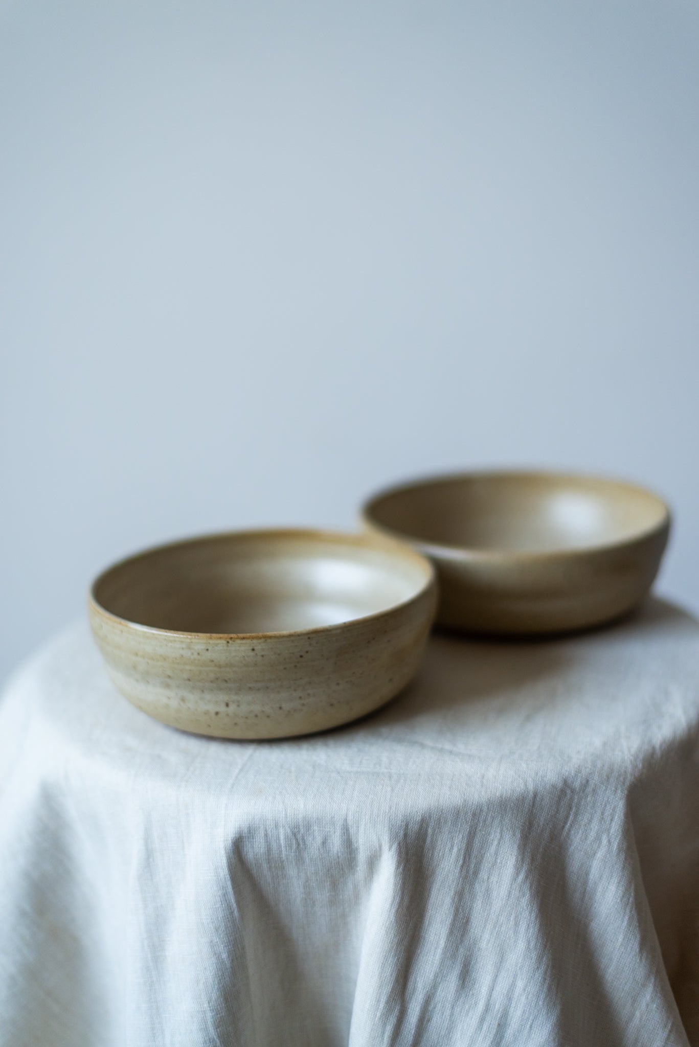 Handcrafted wide ceramic bowl with a glossy finish, perfect for serving salads, fruits, or soups