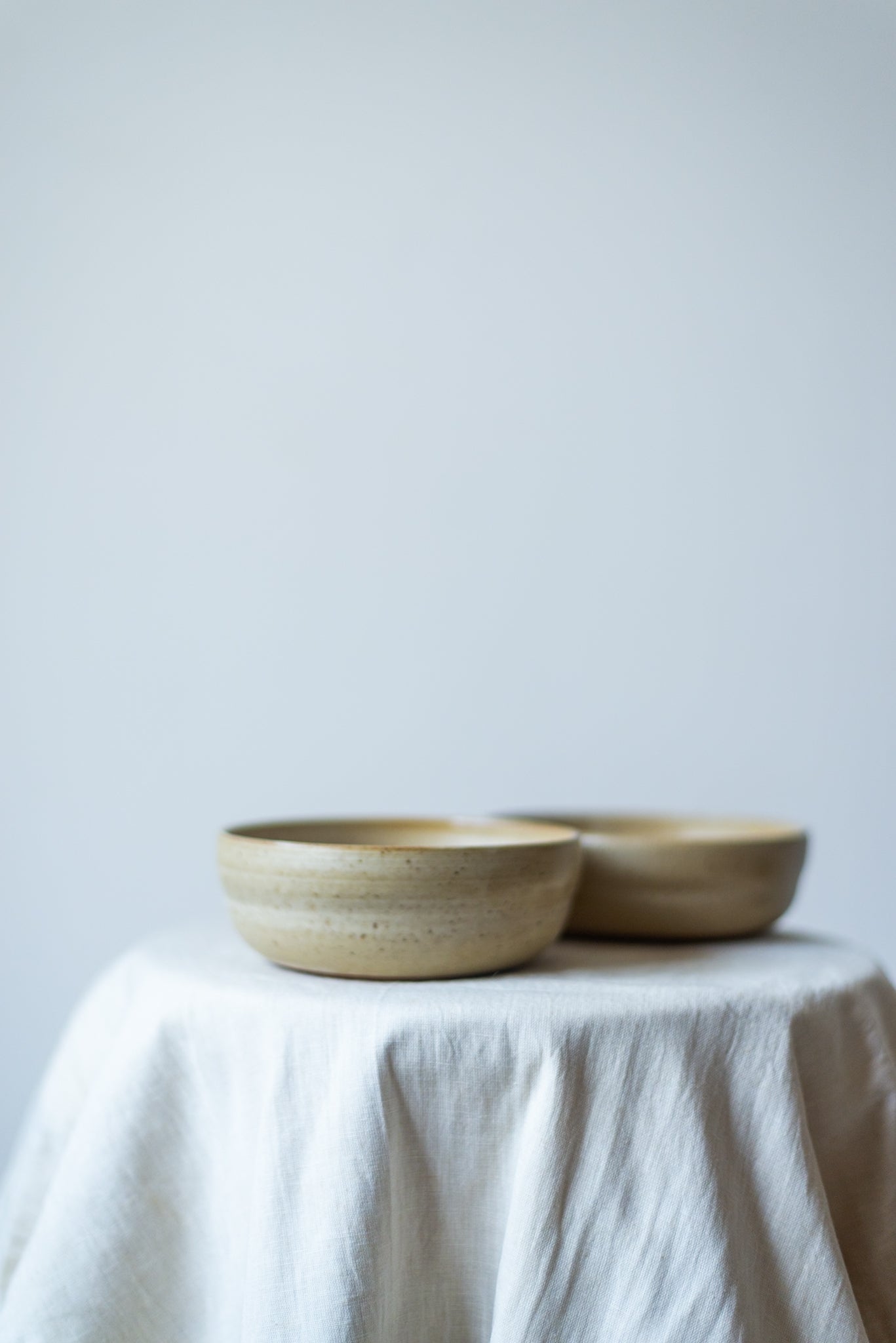 Handcrafted wide ceramic bowl with a smooth glazed finish, perfect for serving salads, fruits, or soups