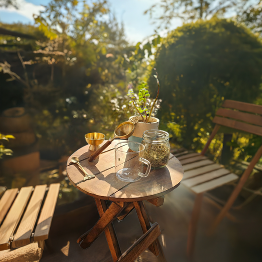 tea strainer brass, used as table decor product on a sunny wamr afternoon